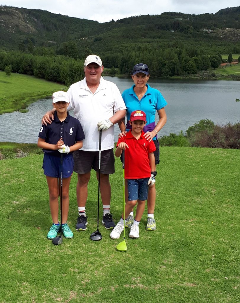 Family off playing Golf. 