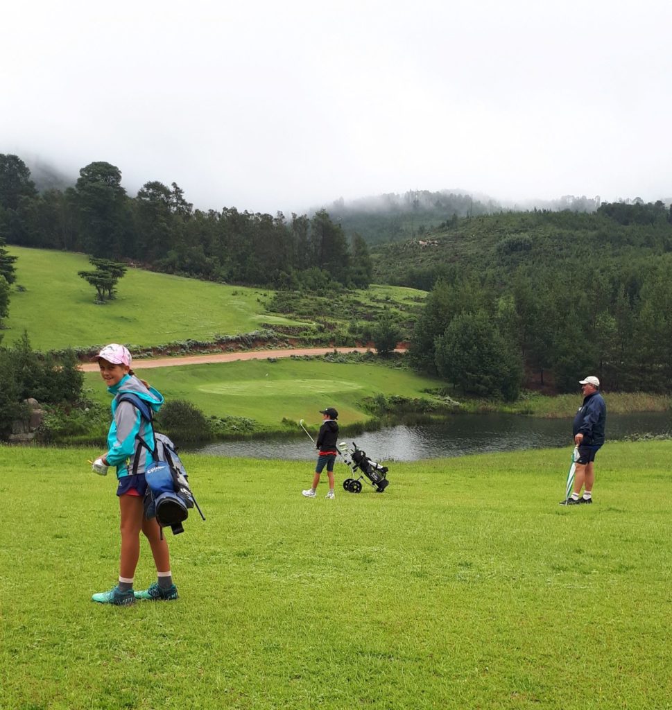 Having fun on the golf course.