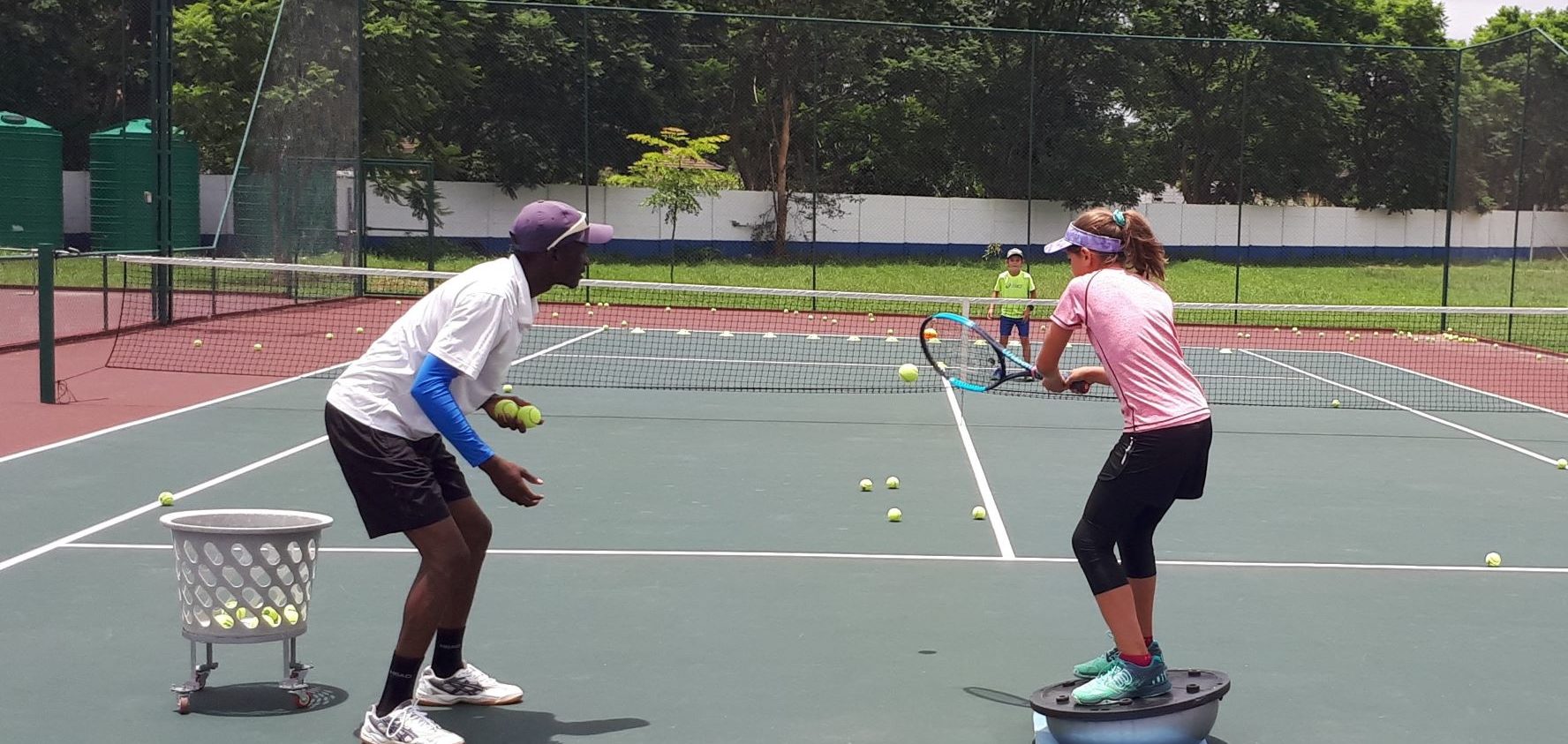 tennis drills balance on bousa ball.