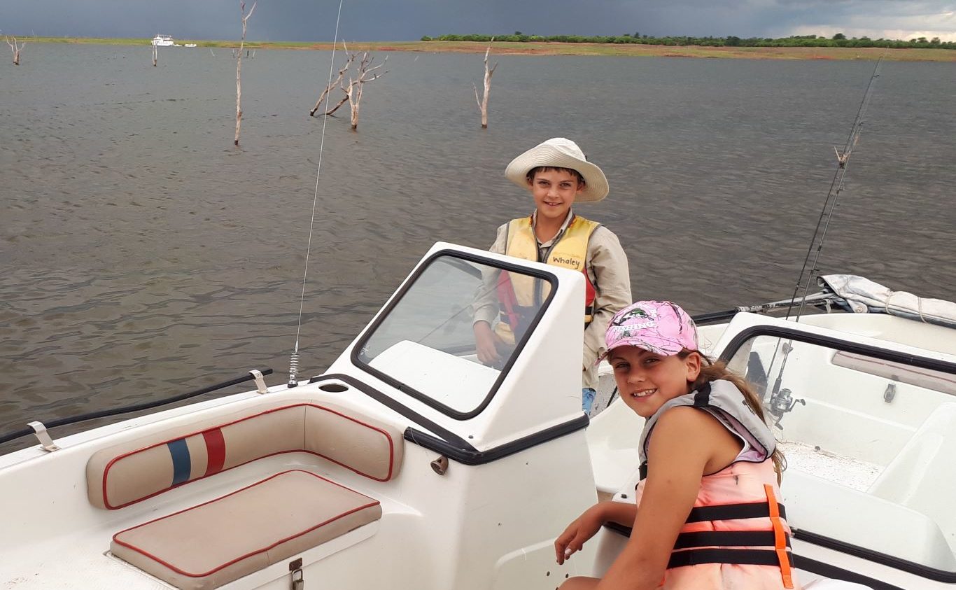 Kids driving the boat