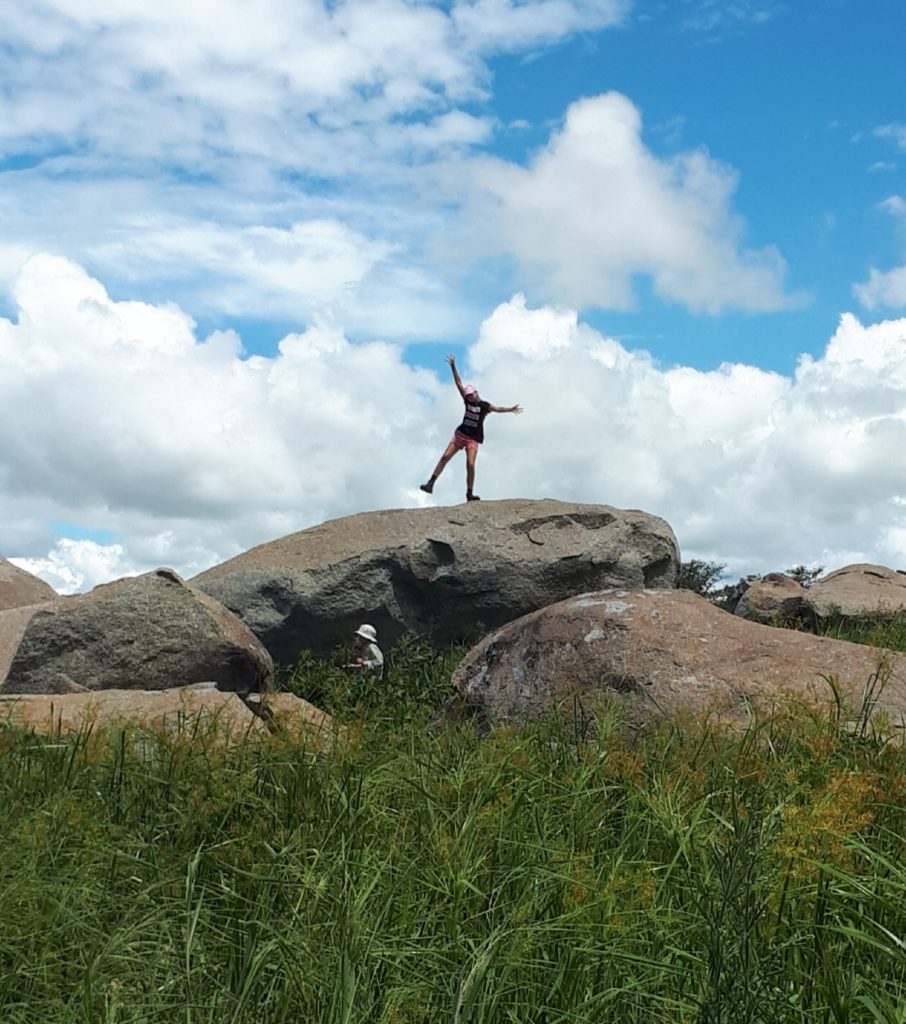 Kids having fun on the dam rocks.