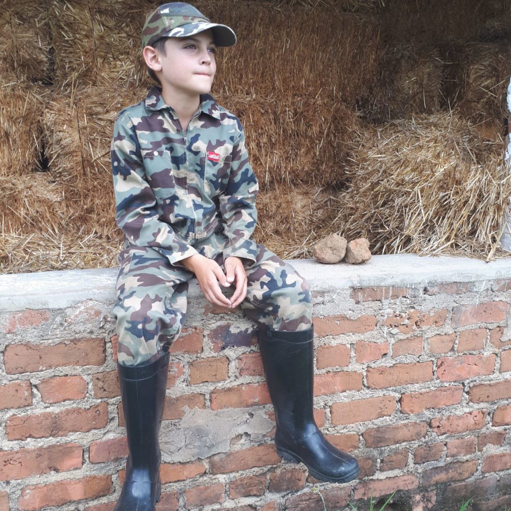 Ready in uniform for a a farm adventure. 
