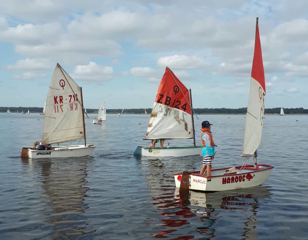 Kids out sailing.