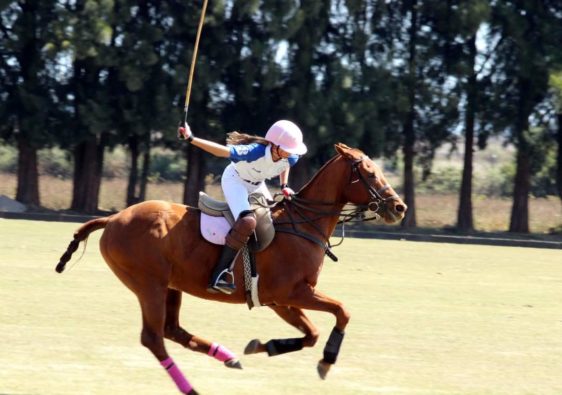 Paula Joy playing polo