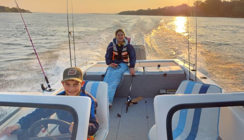 kids driving the boat