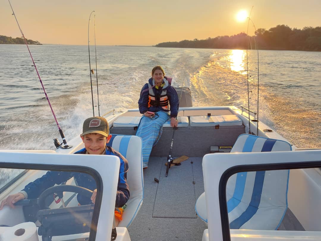kids driving the boat