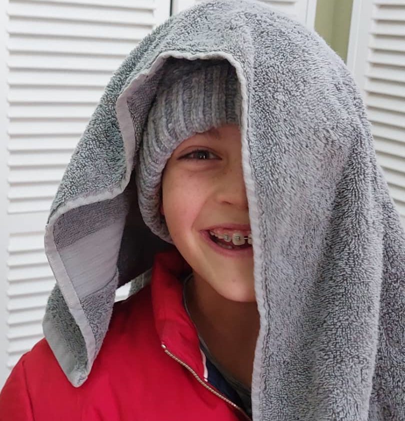 Murray with a towel over half his head.