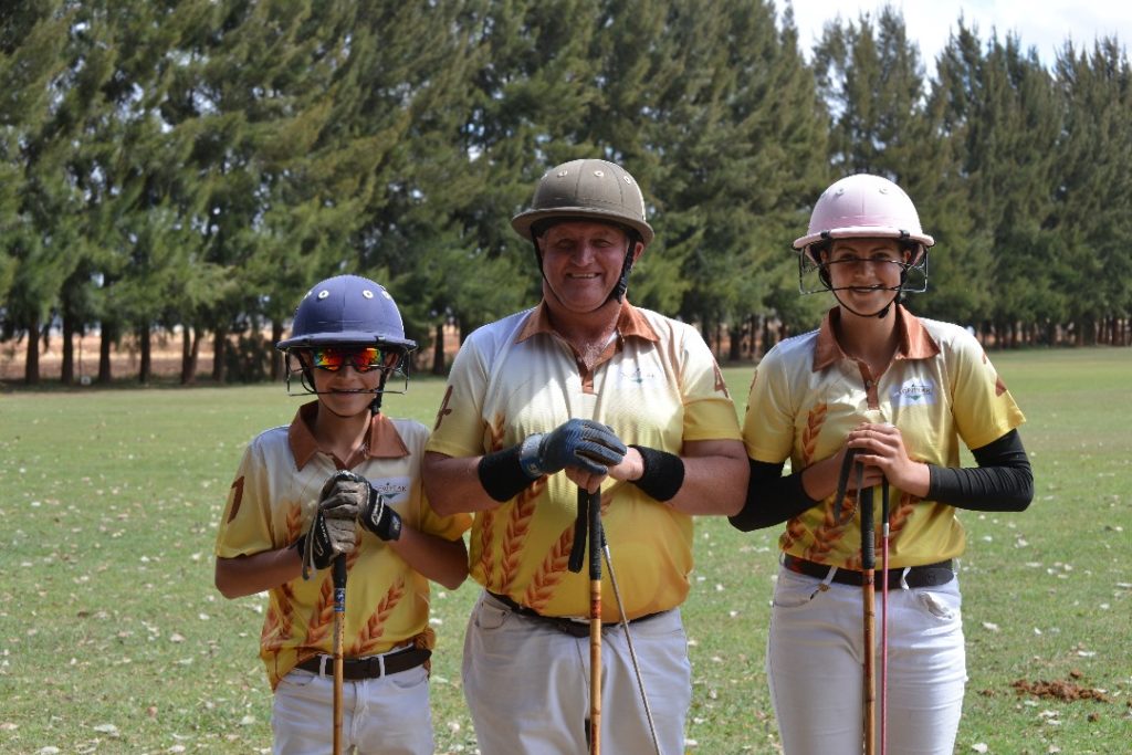 Our homeschooling Adventures and Activities family polo players.