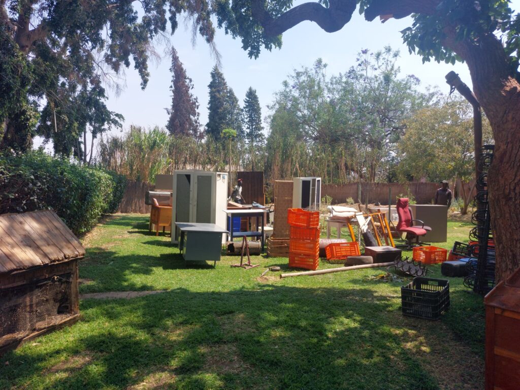 furniture out on the lawn waiting to be loaded