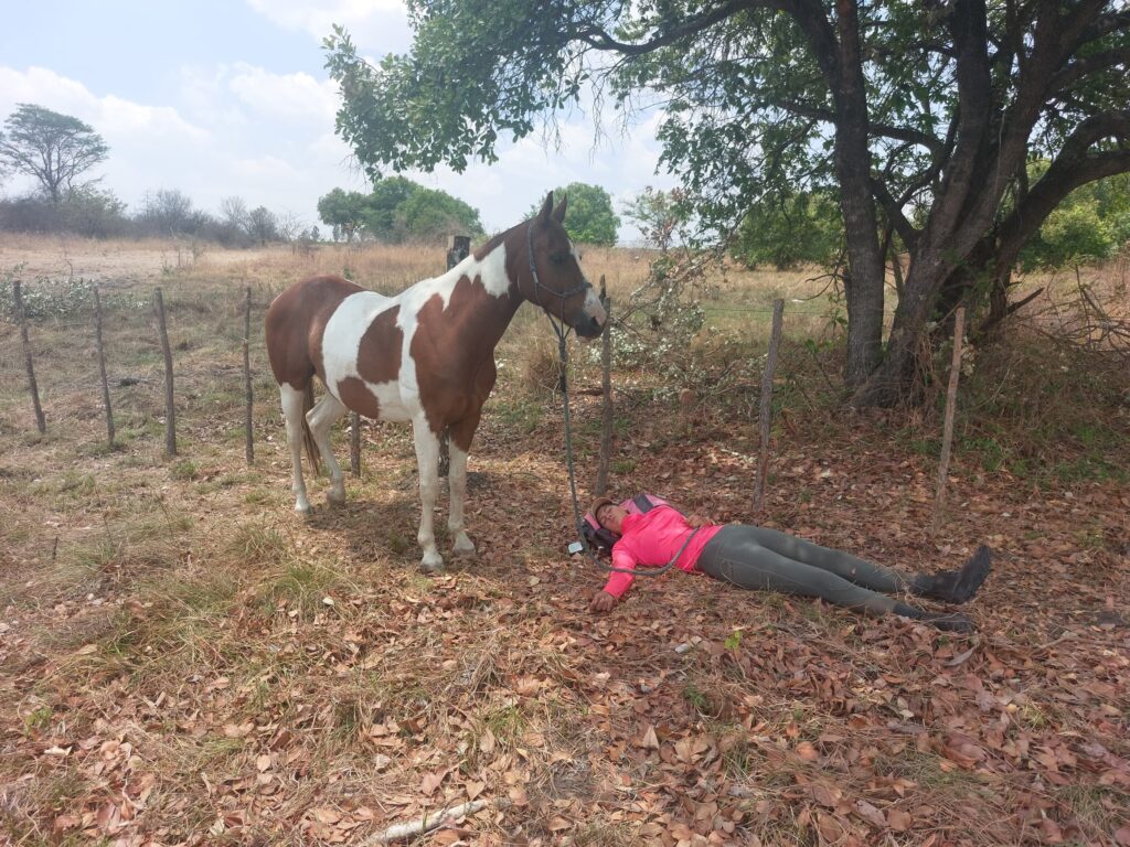 exhausted Paula Joy with her pony Puncho. 